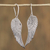 Sterling silver dangle earrings, 'Untamed' - Taxco Sterling Silver Wing Dangle Earrings from Mexico thumbail