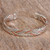 Sterling silver and copper cuff bracelet, 'Taxco Braid' - Braid Motif Taxco Sterling Silver Cuff Bracelet from Mexico