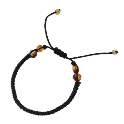 Amber beaded macrame bracelet, 'Age-Old Passion in Black' - Amber Beaded Macrame Bracelet in Black from Mexico