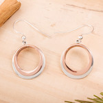 Sterling silver and copper dangle earrings, 'Eclipsed Circle' - Circular Sterling Silver and Copper Dangle Earrings