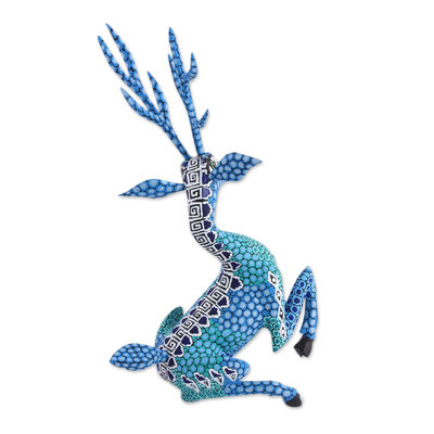 Wood alebrije sculpture, 'Resting Deer' - Hand-Painted Wood Alebrije Deer Sculpture in Blue
