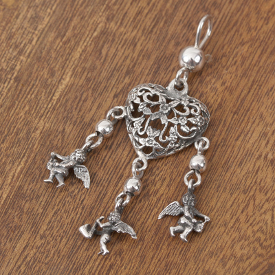 Sterling silver pendant, 'Dreamy Heart' - Heart-Shaped Sterling Silver Pendant Crafted in Mexico