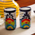 Ceramic tumblers, 'Raining Flowers' (pair) - Hand-Painted Floral Ceramic Tumblers from Mexico (Pair)