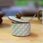 Ceramic decorative jar, 'Cloud Crossing in Green' - Green Striped Ceramic Cylindrical Decorative Jar