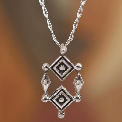 Sterling silver pendant necklace, 'God's Eyes' - Sterling Silver Ojo de Dios Pendant Necklace from Mexico