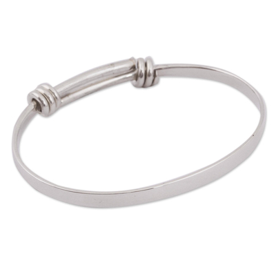 Sterling silver bangle bracelet, 'Gleaming Band' - Simple Sterling Silver Bangle Bracelet Crafted in Mexico