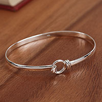 Sterling silver bangle bracelet, 'Ethereal Gleam' - Artisan Crafted Sterling Silver Bangle Bracelet from Mexico