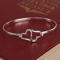 Sterling silver bangle bracelet, 'Heart Harmony' - Sterling Silver Heart Bangle Bracelet from Mexico