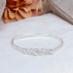 Sterling silver bangle bracelet, 'Irish Knot' - Knot Pattern Sterling Silver Bangle Bracelet from Mexico