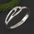 Sterling silver bangle bracelet, 'Osmosis' - Modern Sterling Silver Bangle Bracelet from Mexico
