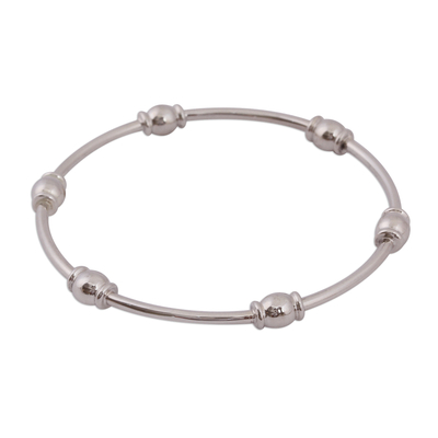 Sterling silver bangle bracelet, 'Six Beads' - Gleaming Sterling Silver Bangle Bracelet from Mexico