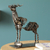 Upcycled metal tealight candle holder, 'Deer Rib' - Upcycled Metal Auto Part Deer Candle Holder from Mexico thumbail