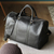 Leather travel bag, 'Ebony Traveler' - Handmade Leather Travel Bag in Ebony from Mexico thumbail