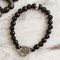 Onyx beaded stretch bracelet, 'Stylized Jaguar' - Onyx Beaded Stretch Bracelet with Jaguar Pendant from Mexico