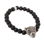 Onyx beaded stretch bracelet, 'Stylized Jaguar' - Onyx Beaded Stretch Bracelet with Jaguar Pendant from Mexico