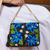 Leather accented cotton sling, 'Yucatan Flowers' - Leather Accented Cotton Sling with Blue Floral Embroidery (image 2) thumbail