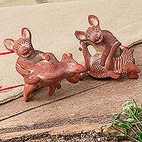 Ceramic ornaments, 'Playful Dogs' (pair)