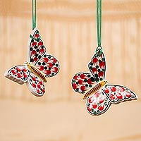 Adornos de cerámica, 'Mariposa navideña' (par) - Adornos de mariposas de cerámica pintados a mano de México (par)