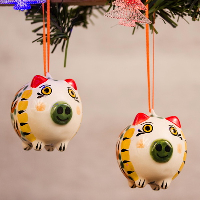 Ceramic ornaments, 'Jolly Pigs' (pair) - Orange and Green Ceramic Pig Ornaments from Mexico (Pair)
