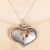 Sterling silver pendant necklace, 'Cutout Heart' - Heart-Shaped Sterling Silver Pendant Necklace from Mexico thumbail