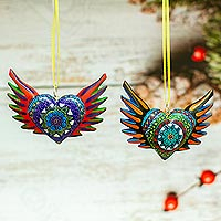 Wood ornaments, 'Hearts Take Wing' (set of 4) - Wooden Winged Hearts Holiday Ornaments (Set of 4)