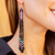 Glass beaded waterfall earrings, 'Black Diamond Talisman' - Handcrafted Black Beadwork Huichol Waterfall Earrings