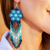 Glass beaded waterfall earrings, 'Turquoise Jikuri' - Turquoise Floral Beadwork Huichol Waterfall Earrings