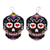 Ohrhänger aus Glasperlen - Perlenstickerei Tag der Toten Huichol-Ohrringe mit schwarzem Totenkopf