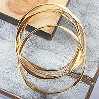 Gold plated stacking bangle bracelets, Gold Ribbon (set of 7)