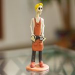 Ceramic sculpture, 'Barber Catrin' - Artisan Crafted Skeletal Barber Sculpture