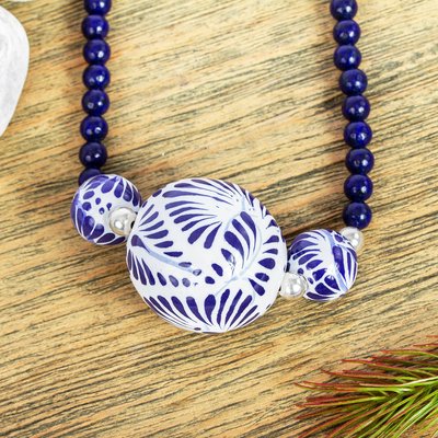 Lapis lazuli and ceramic pendant necklace, 'Indigo Garden' - Ceramic Pendant Necklace with Lapis Lazuli