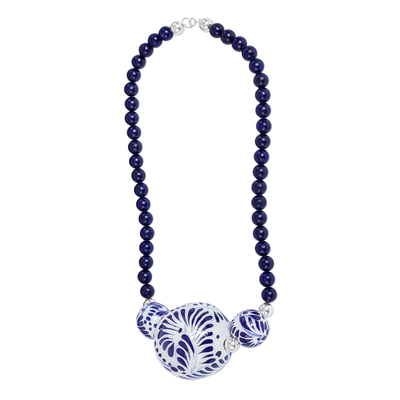 Lapis lazuli and ceramic pendant necklace, 'Indigo Garden' - Ceramic Pendant Necklace with Lapis Lazuli