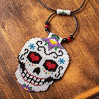 Glass beaded pendant necklace, 'White and Lilac Skeleton' - Beadwork Day of the Dead White-Lilac Skull Huichol Necklace