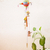 Windspiel aus Keramik - Windspiel aus Keramik mit Piñata-Motiv
