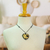 Halskette mit Pappmaché-Anhänger - Handbemalte schwarz-beige Pappmaché-Herzkette