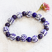 Lapis lazuli beaded pendant bracelet, 'Blue Puebla Blossoms' - Lapis Lazuli and Talavera Style Ceramic Floral Bracelet