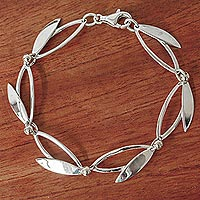 Gold-accented silver charm bracelet, 'Silver Blades'