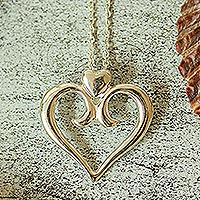 Sterling silver pendant necklace, 'Mother's Heart' - Sterling Silver Curly Heart Pendant Necklace from Mexico