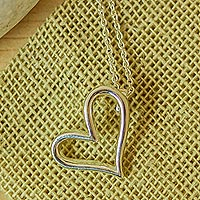 Sterling silver pendant necklace, 'Asymmetrical Heart' - 925 Sterling Silver Heart Pendant Necklace from Mexico