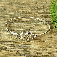 Sterling silver bangle bracelet, 'Taxco Love Knot' - Romantic Sterling Silver Bangle Bracelet