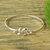 Sterling silver bangle bracelet, 'Taxco Love Knot' - Romantic Sterling Silver Bangle Bracelet thumbail