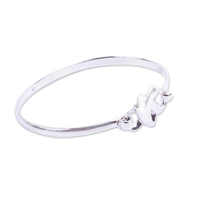 Sterling silver bangle bracelet, 'Taxco Love Knot' - Romantic Sterling Silver Bangle Bracelet