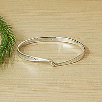 Sterling silver bangle bracelet, 'Minimalist Twist' - Minimalist Taxco Sterling Silver Bangle Bracelet from Mexico
