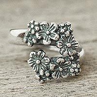 Sterling silver wrap ring, 'Flower Parade' - Floral Sterling Wrap Ring
