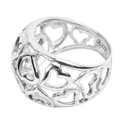 Sterling silver domed ring, 'Hearts Galore' - Heart Motif Domed Ring