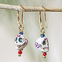 Hand-painted marble dangle earrings, 'Smiling Calavera' - Skull Motif Dangle Earrings