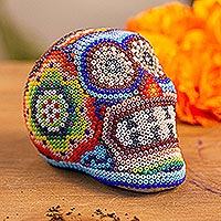 Featured review for Huichol beaded papier mache skull, Huichol Grin
