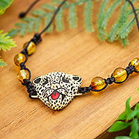 Amber and ceramic pendant bracelet, 'Tuxtla Jaguar' - Jaguar Head and Amber Bead Knotted Bracelet From Mexico