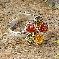Amber cocktail ring, 'Five Glowing Petals' - Five Petal Amber Sterling Silver Cocktail Ring with Flower