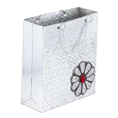 Aluminum repousse decorative box, 'Hearts and Flower' - Aluminum Gift Bag-Shaped Decorative Container with Flower
